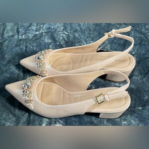 Adrienne Vittadini beige flats with rhinestones.